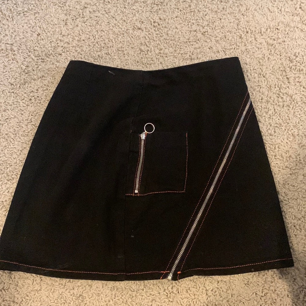 BDG: Black with orange threading zippered skirt . Size SMALL.